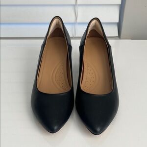 Nisolo Black Pumps